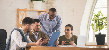 Colleagues working together in a modern office